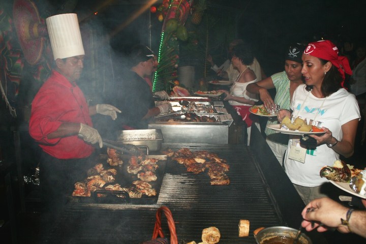 a man that is cooking some food