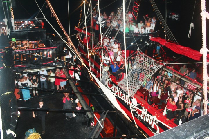 a group of people performing on stage in front of a crowd