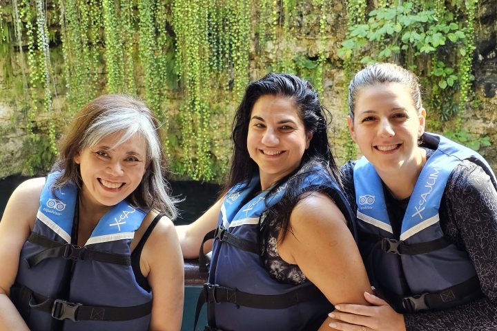 a group of people posing for the camera