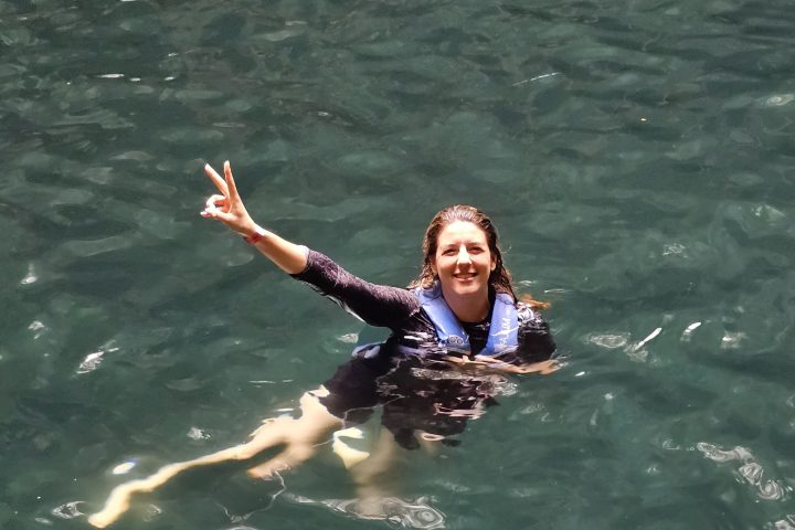 a man and woman swimming in the water