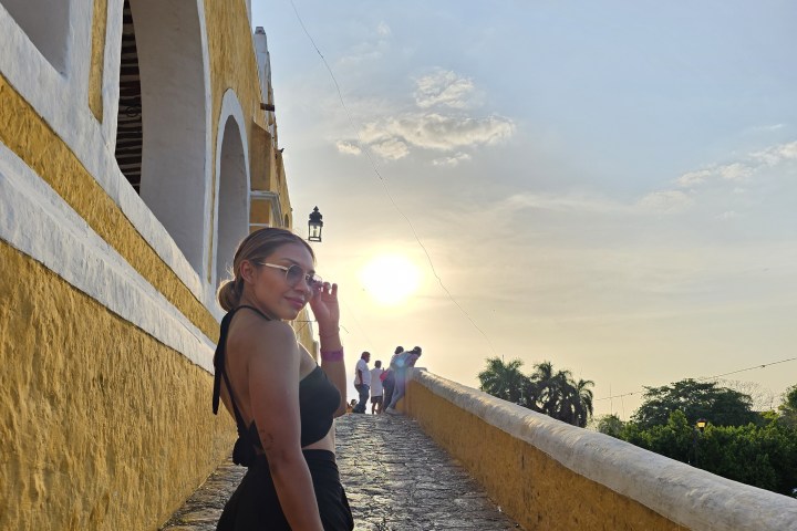 a person standing on a bridge
