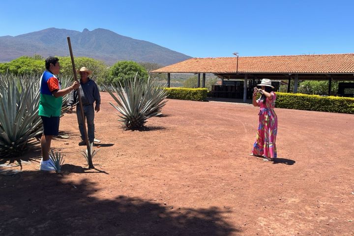 a little boy that is standing in the dirt