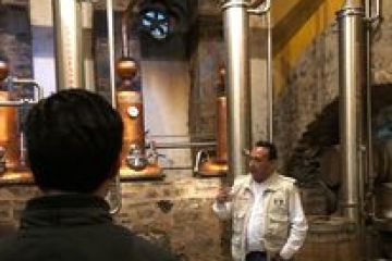 a group of people standing in front of a building