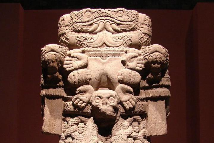 a stone statue of a person