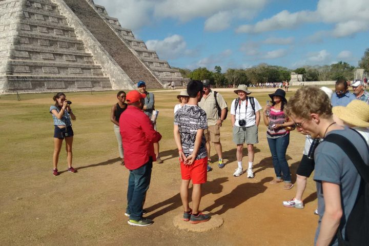 a group of people standing in front of a building