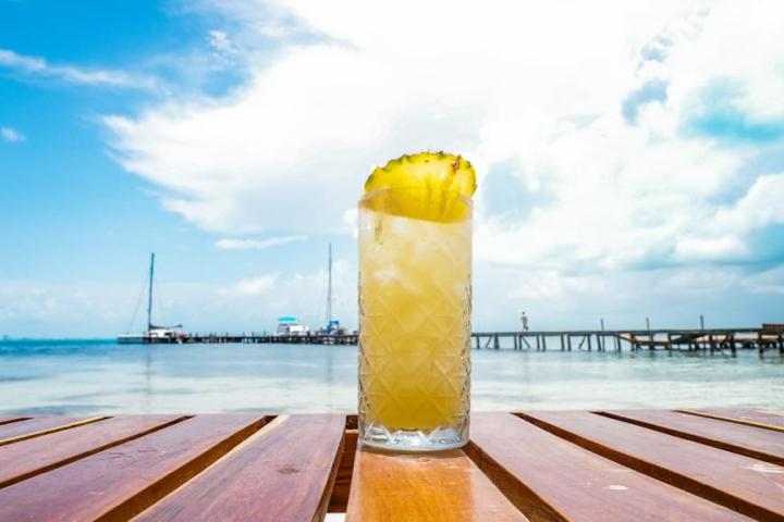a wooden pier next to a body of water