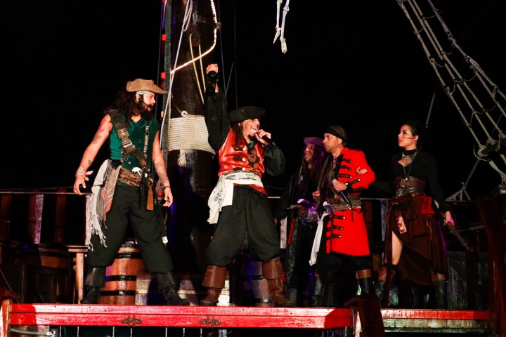 a group of people standing on a stage