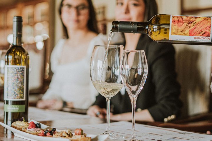 a bottle and a glass of wine