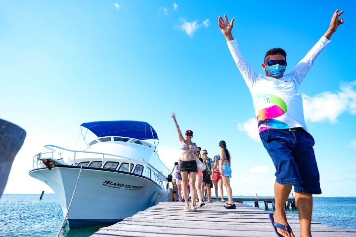 a man riding on the back of a boat