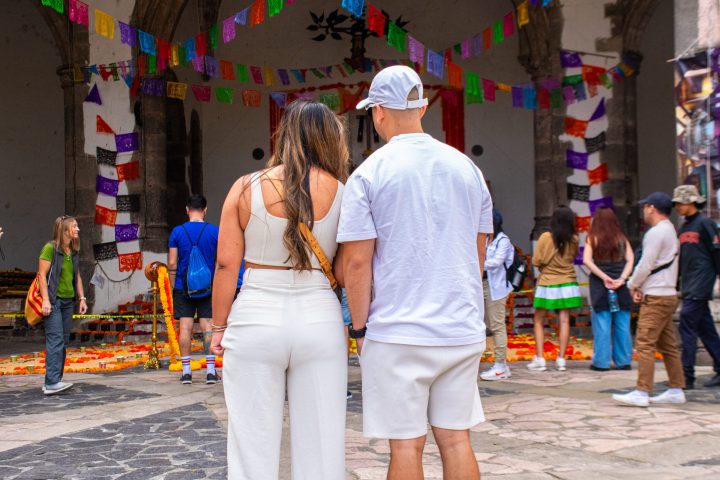 a group of people walking down the street