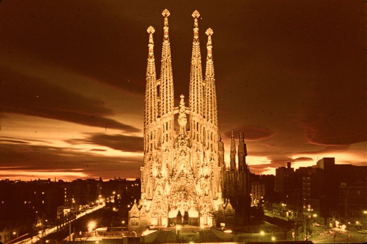 a large clock tower towering over a city