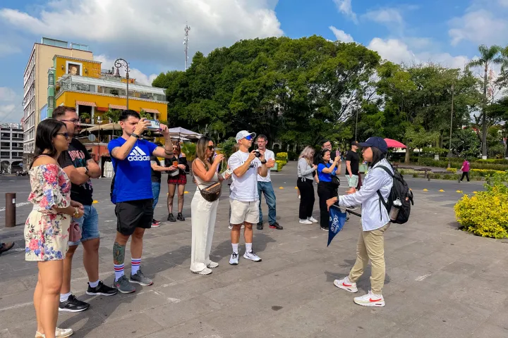 a group of people standing in front of a crowd