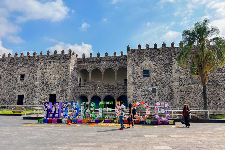 a group of people in front of a building