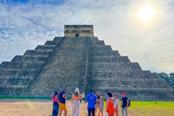 a group of people standing in front of a building