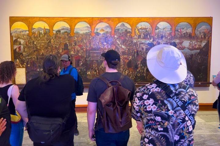 a group of people standing in a room