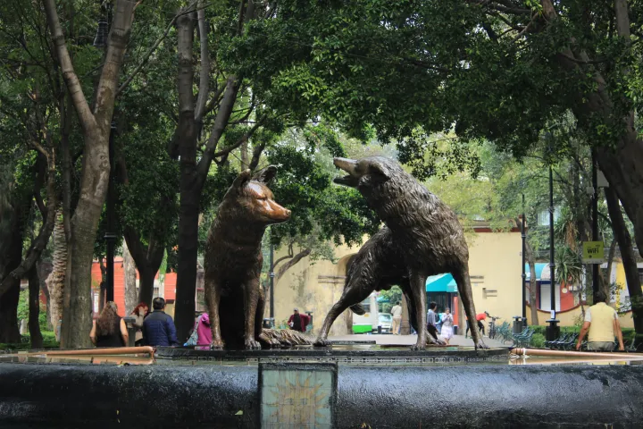 a group of people sitting at a zoo