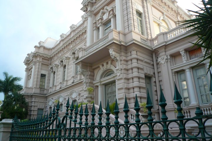 a statue in front of a building