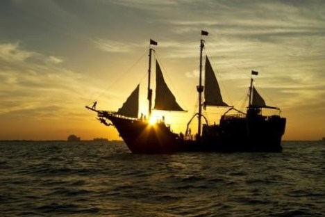 a small boat in a large body of water