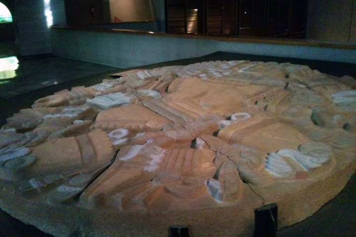 a pizza sitting on top of a table