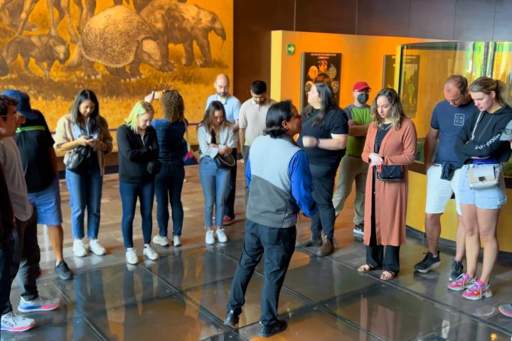 a group of people standing in a room