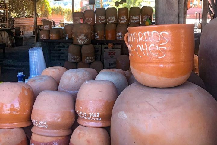 two oranges sitting on top of a building