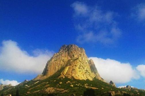 a large mountain in the background