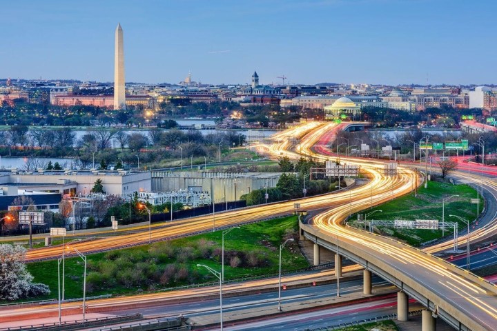 a view of a city on a train track