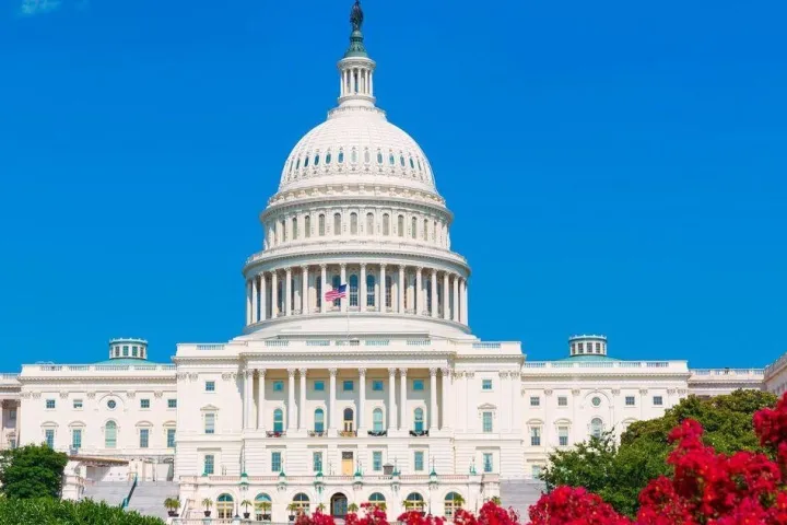 a large building with United States Capitol in the background