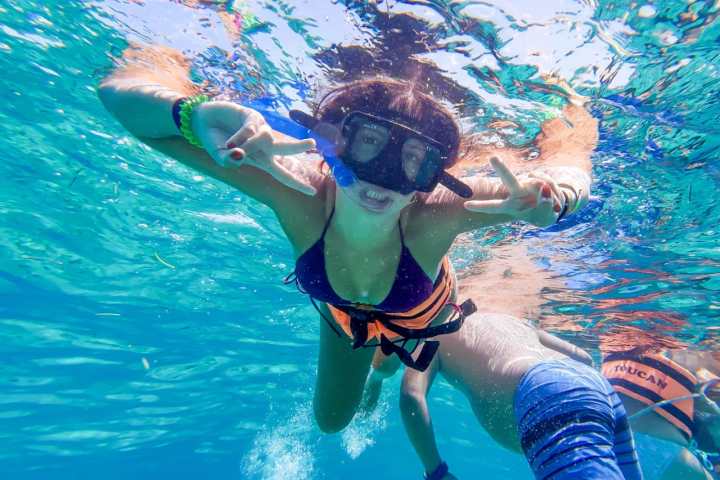 a person swimming in a pool of water