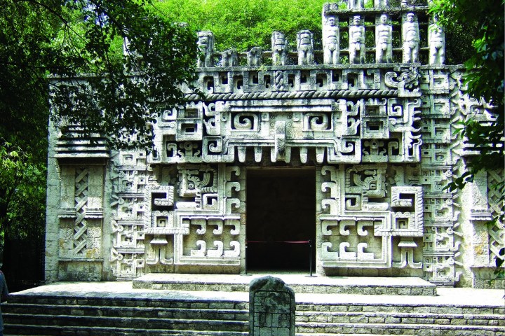 a statue in front of a building