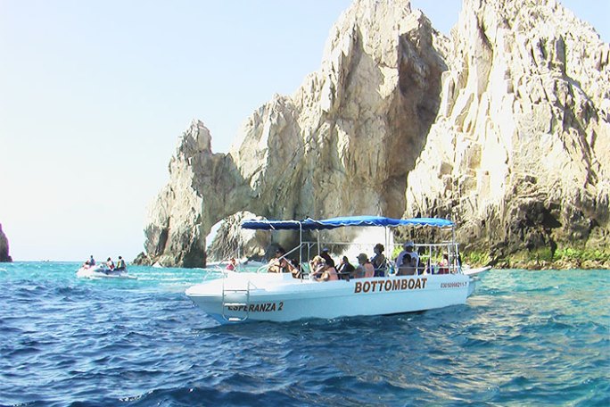 a group of people on a boat in the water
