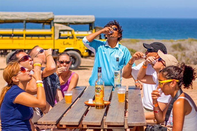 a group of people sitting on a bench