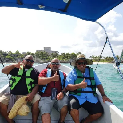 a couple of people that are sitting on a boat