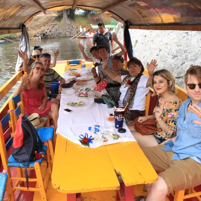 a group of people sitting on a boat