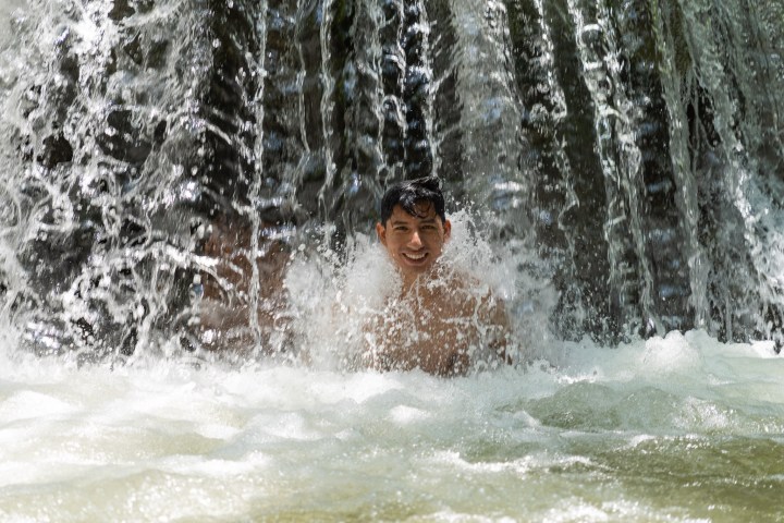 a waterfall into a body of water