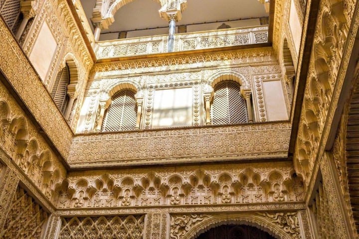 a clock hanging off the side of a building