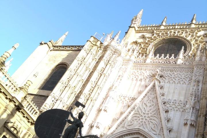 a clock tower in front of a building