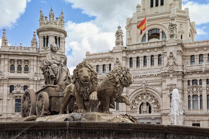 a group of people standing in front of a building
