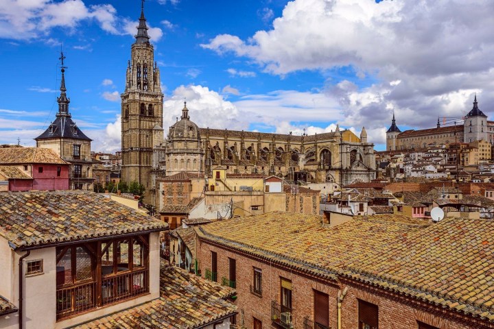 a large clock tower in front of a building
