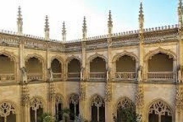 a group of people standing in front of a building
