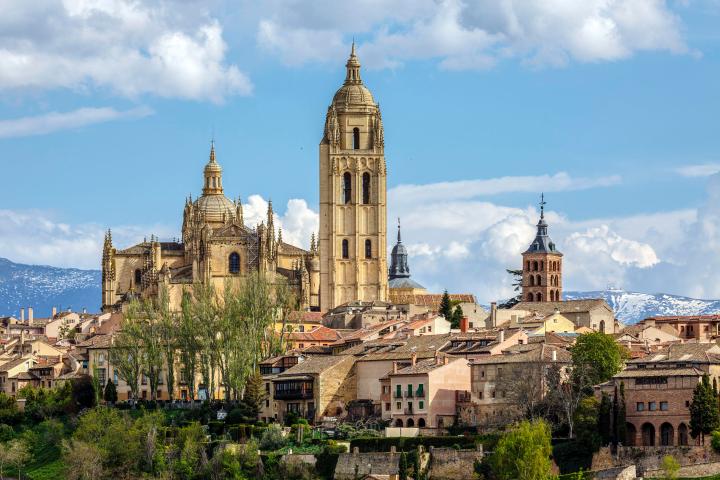 a large clock tower towering over a city