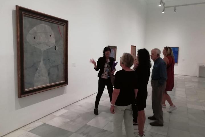 a group of people standing in a room