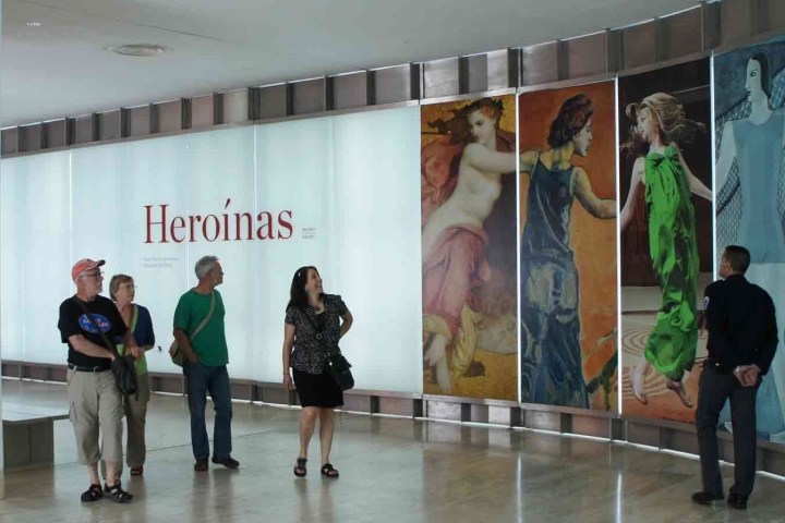 a group of people standing in a room