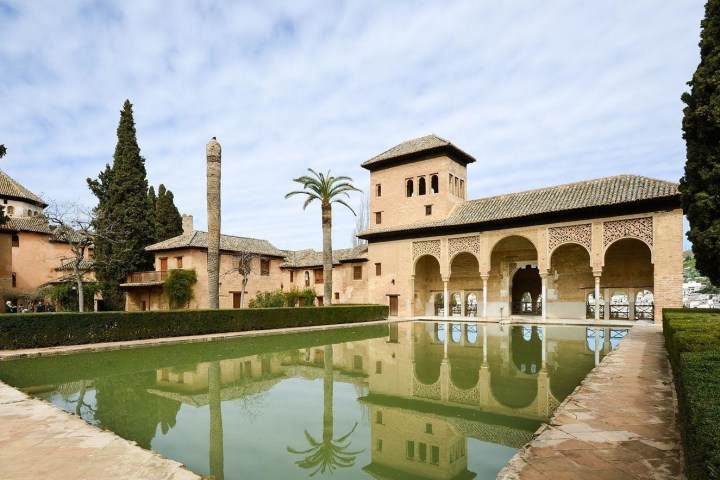 a castle with water in the background