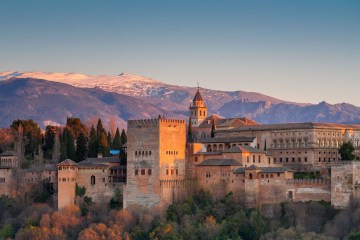 a castle like building with Alhambra in the background