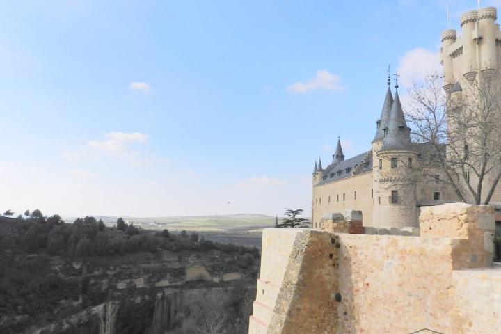 a castle on top of a stone building