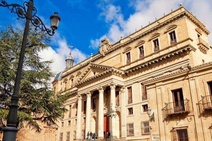 a statue in front of a building