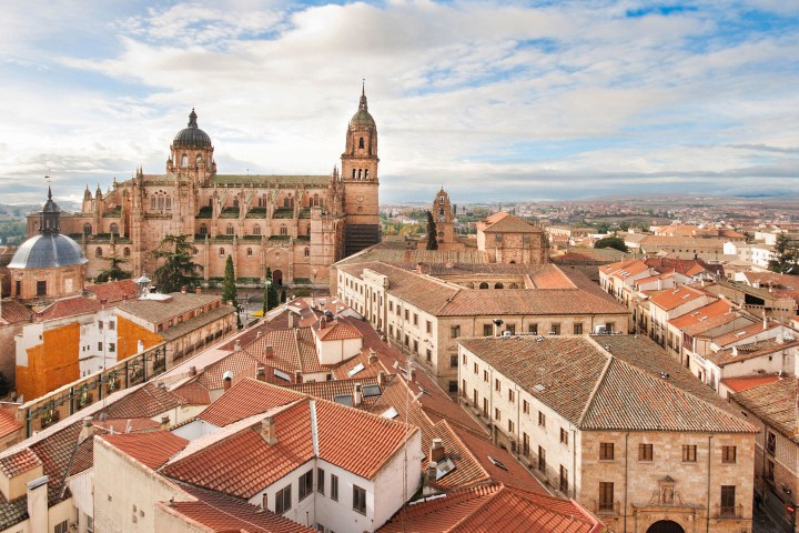 a group of people in front of a building