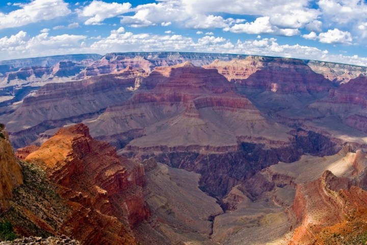 a canyon with a mountain in the background