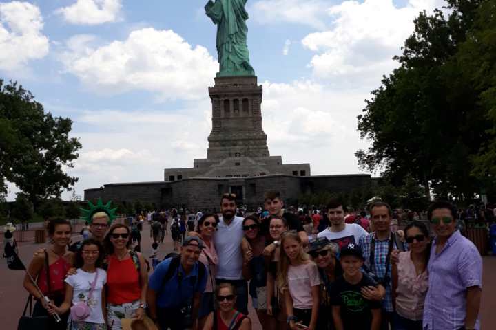 a group of people standing in front of a crowd